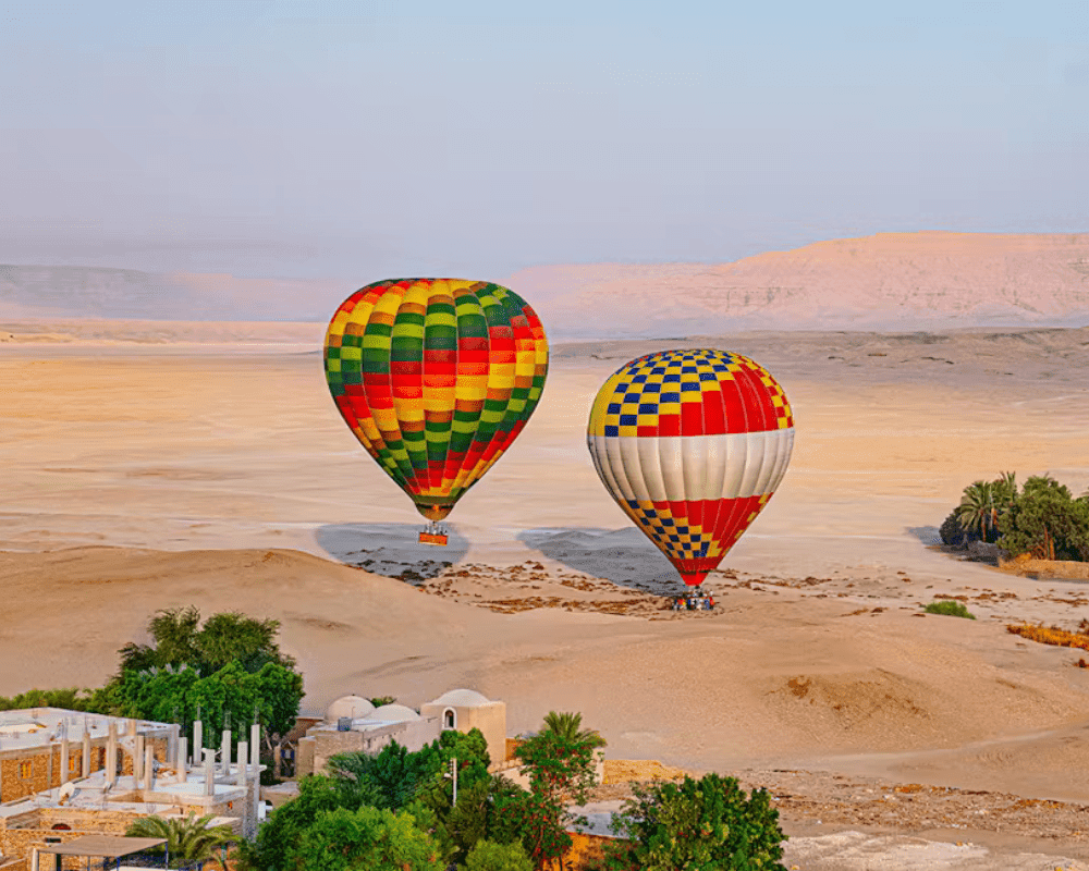 Hot air balloon at sunrise over the Valley of the Kings in Luxor