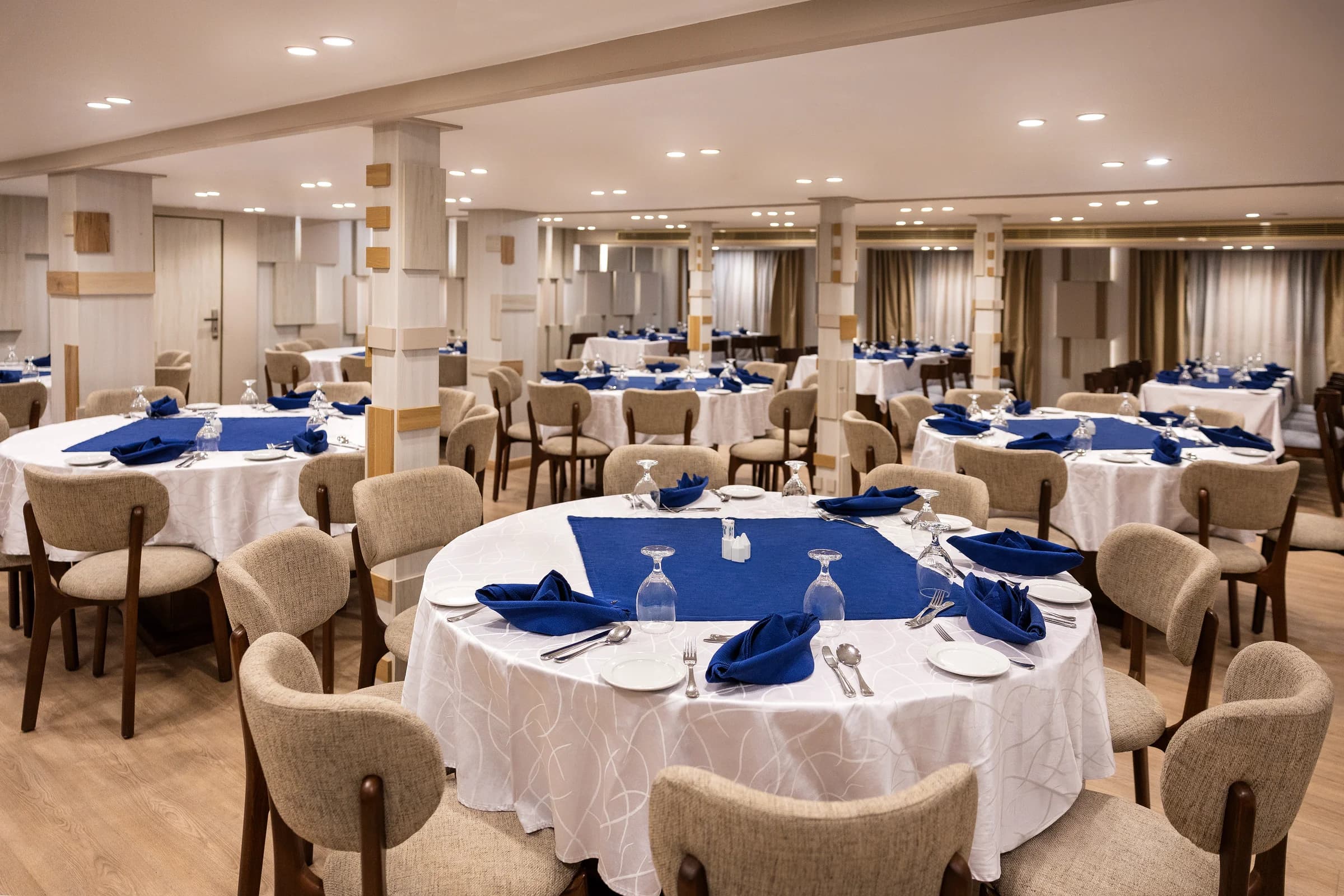 Restaurant laid for dinner on the M/S Alma