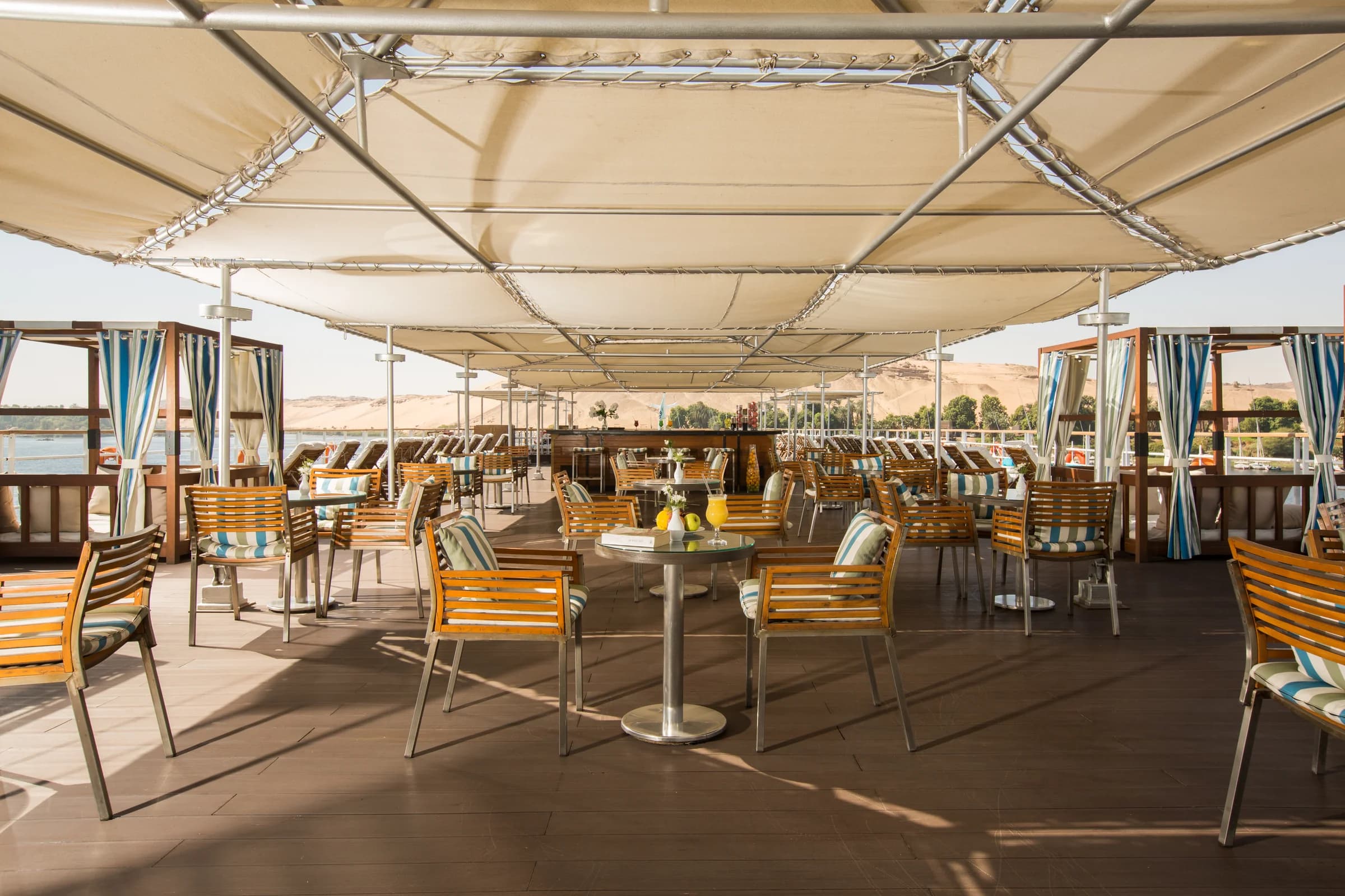 Shaded deck restaurant on the M/Y Alyssa