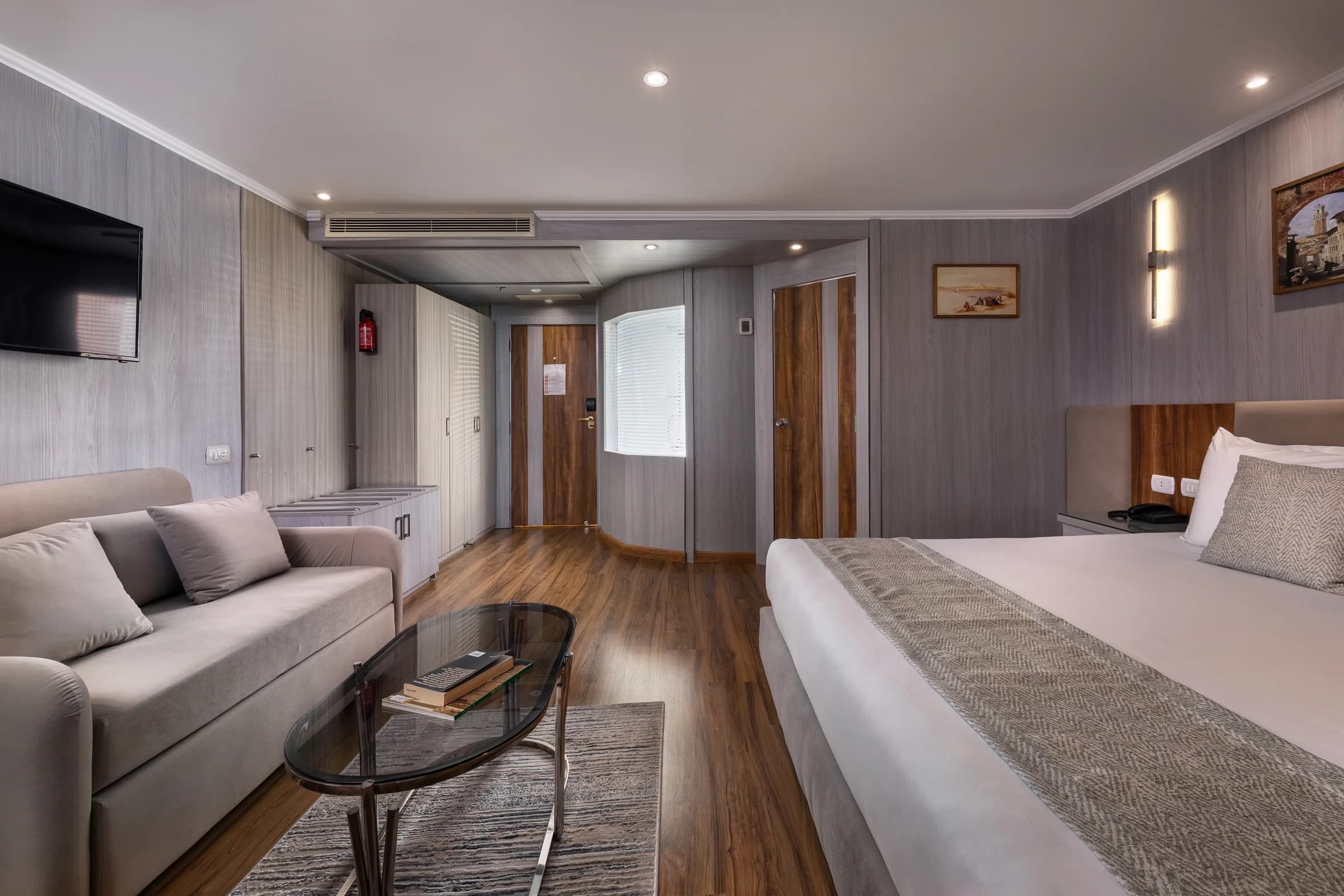 Cabin with sitting area on the M/S Chateau Lafayette