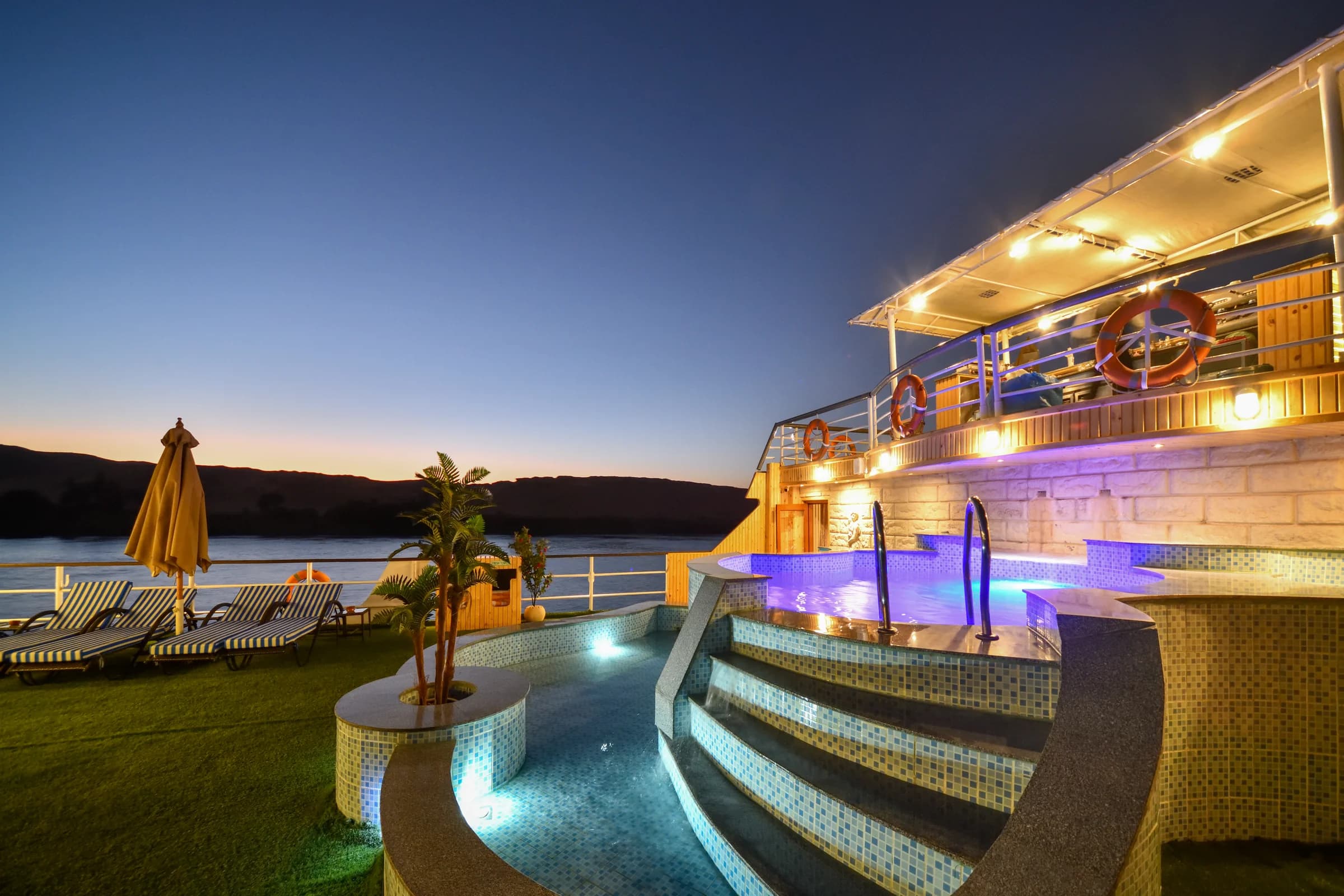 The pool deck of the M/S Nile Treasure at night