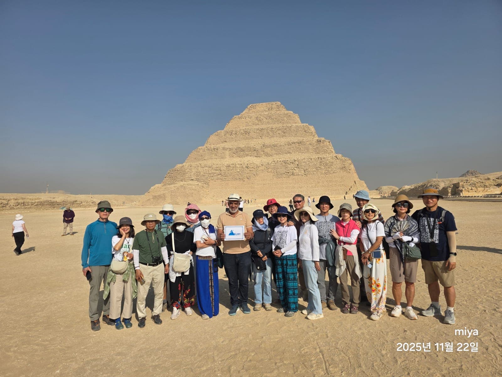 Tour group at the Step Pyramid of Djoser at Saqqara, visited on a day trip from Cairo